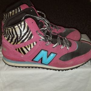 New Balance pink high tops.